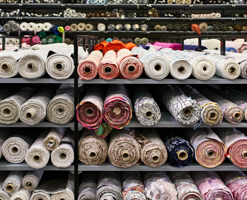 rolls of customizable fabric on shelves